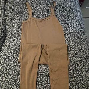 tan body suit